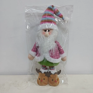 Detail of colorful plush Santa gnome with rainbow patterns and festive reindeer boots