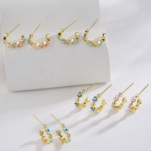 5 pairs of gold 18K plated C-shaped hoop earrings with zircon heart and evil eye designs