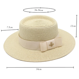 Detailed size chart for beige straw boater hat featuring dimensions and bee brooch