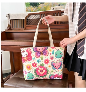 Detailed shot of canvas tote bag with colorful butterfly print in a warm lifestyle setting