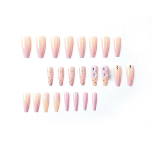 Long coffin press-on nails featuring purple gradient, 3D flowers and sparkling rhinestones