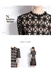 Détails de robe midi en dentelle brodée noire avec motifs floraux et col montant festonné