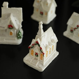 Luminous resin Christmas snow house miniature with red bows and white snowy textures
