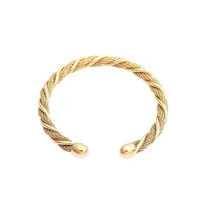 Luxurious gold braided twisted bangle bracelet with polished spherical ends in titanium steel