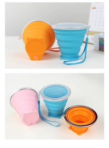 Collapsible silicone cups in orange, blue, and pink showing flat folded and expanded states