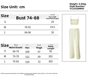 Tabella taglie dettagliata per set top a spalline e pantaloni a gamba larga con misure