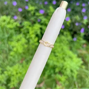 18K gold plated belt buckle ring with rectangular zircon stones on white holder