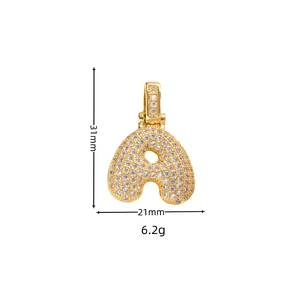 Close-up of gold-plated iced out letter A pendant with white zircons and dimensions