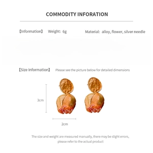 Detail specifications of golden flower earrings with dimensions and material info