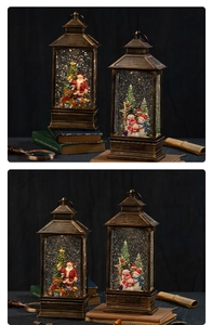 Close-up of vintage bronze Christmas lantern music box with glowing snow scene detail