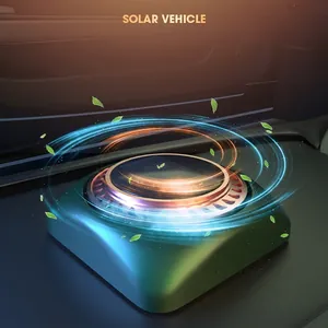 Solar powered rotating car aromatherapy diffuser with matte green base and metal accents