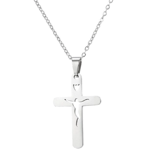 Macro detail of silver cross pendant with hollow Jesus silhouette on a fine link chain