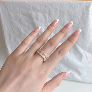 Elegant S925 sterling silver gold ring with clear rectangular zircons on hand