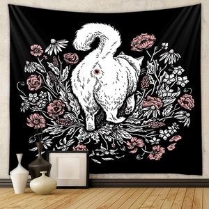 Black tapestry featuring white cat and pink flowers for wall decoration in a modern room