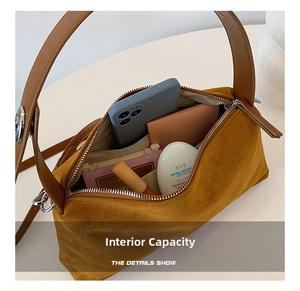 Macro view showing spacious interior of vintage suede tote bag with cosmetic items