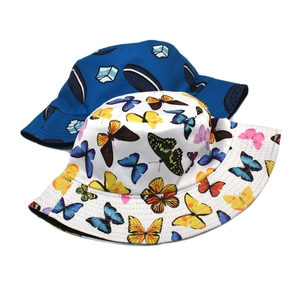 Double-sided bucket hat with butterfly and milk patterns for sun protection