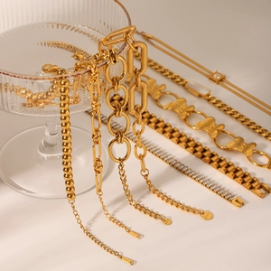 Gold stainless steel butterfly charm bracelet set with zircon and beaded chain links