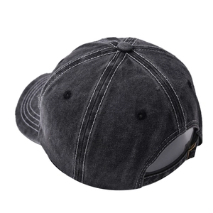 Detail view of the vintage distressed baseball cap with adjustable metal strap and white stitching