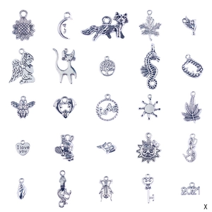 Collection of 25 vintage silver alloy charms with animal and nature motifs for DIY jewelry