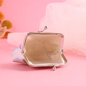 Detail of cartoon unicorn kiss-lock coin purse showing inner lining and metal closure