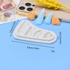 White silicone mold for tropical leaf fondant cake decorations and chocolate garnishes