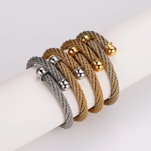 Twisted stainless steel cable wire cuff bracelets with gold and silver bead endings