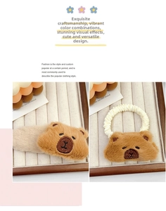 Detail of plush brown bear hair clip and scrunchie set with cute embroidered faces