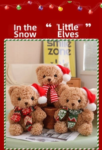 Detail of Christmas teddy bears with red Santa hats and festive striped knit scarves