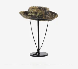 Detail of camouflage sun hat with wide brim, windproof cord and breathable metal eyelets