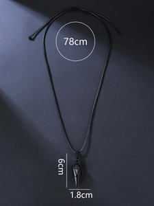 Detail view of black obsidian hexagonal cone pendant with dimensions 6.0cm by 1.8cm