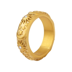 Golden titanium steel celestial ring with sun, moon, and star relief with white zircon