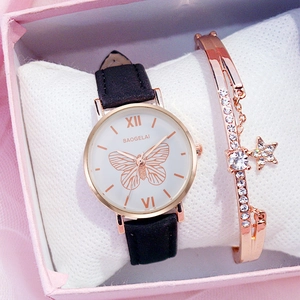 Luxury rose gold butterfly watch and star bracelet set in a romantic pink gift box