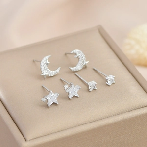 Star and moon stud earring set in silver with cat eye stones and sparkling zircons