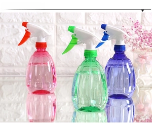 Three-piece set of colorful manual spray bottles with transparent vertical textures