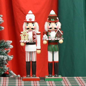 Nutcracker soldier figurines set with gingerbread and cupcake hats for Christmas decor