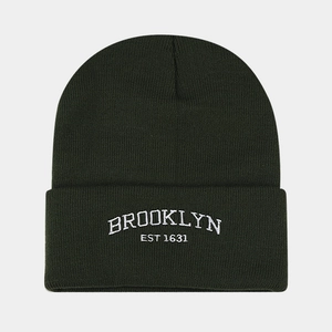 Detail of Brooklyn embroidery on forest green knitted beanie with ribbed texture