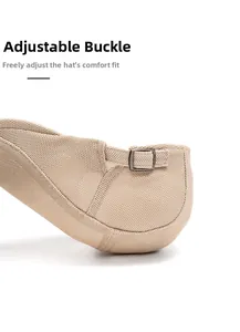 Close-up of adjustable metal buckle on beige mesh beret showing premium fabric texture