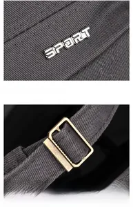 Detail of dark gray cotton cap featuring metal SPORT logo and adjustable back strap