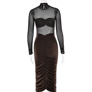 Detail of sheer black mesh back and ruched brown bodycon skirt on a female mannequin