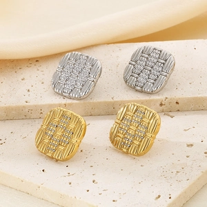 Square starburst earrings with 18K gold plating and sparkling crystals on stone