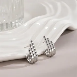 Minimalist silver vertical bar earrings in polished stainless steel for women