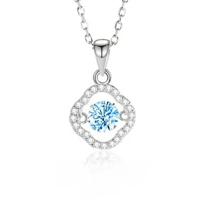 Macro shot of S925 sterling silver heart pendant with dancing blue zircon stone