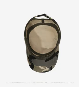 Detail view of the adjustable metal buckle and interior lining of the camouflage patrol cap