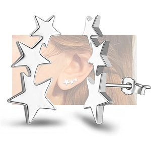 Triple star cluster stud earrings in silver metal with minimalist five-pointed star design
