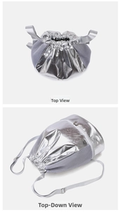 Detail of silver drawstring bag with breathable mesh and bottom zipper compartment