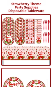 Close-up of strawberry themed party supplies including Sweet One plates and napkins