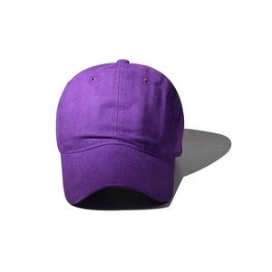 Front view of a dark purple washed cotton baseball cap with a pre-curved brim and six panels