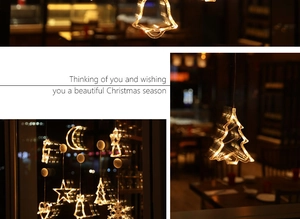 Detail of warm white LED Christmas window lights in star and reindeer shapes