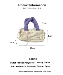 Quilted cream pencil case and makeup bag with purple handle and size dimensions