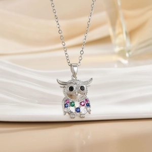 Vintage owl necklace in stainless steel with colorful zircon stones and pearl detail